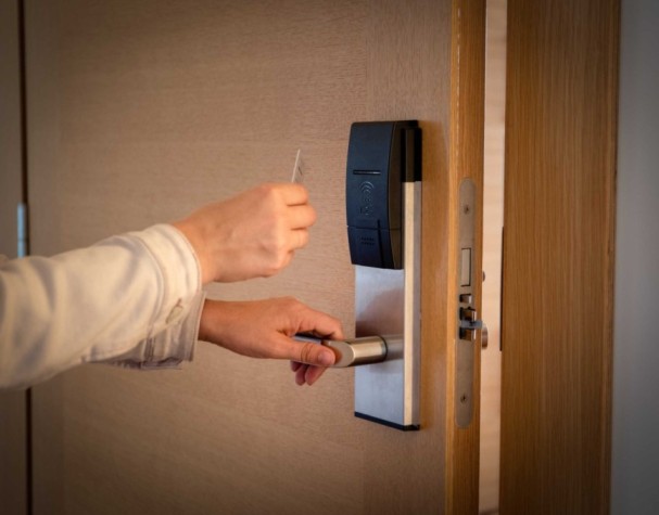 Access control reader installed at a secure entrance
