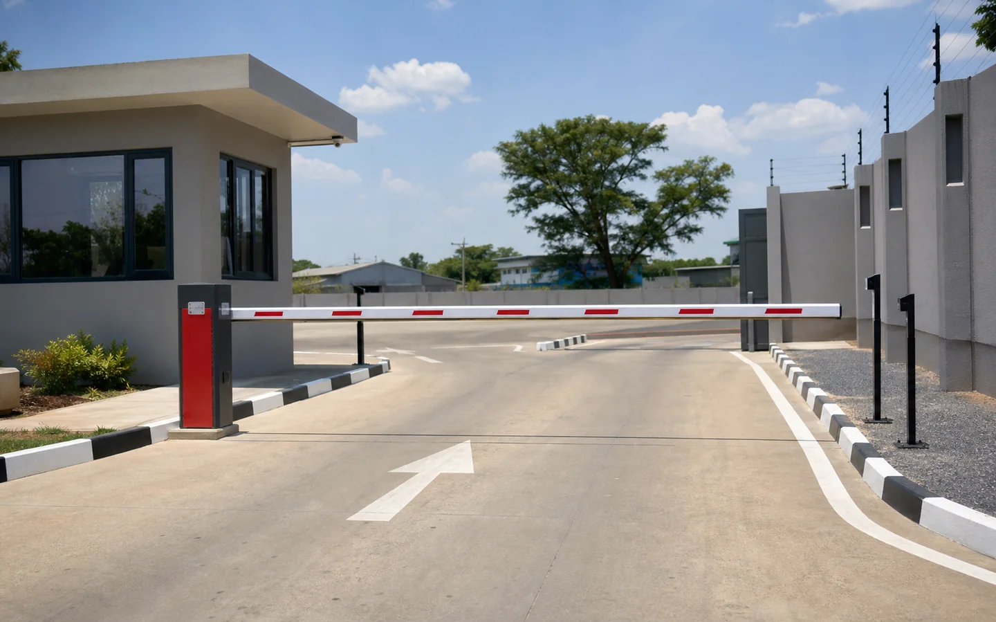 Automatic boom gate at a controlled vehicle entrance