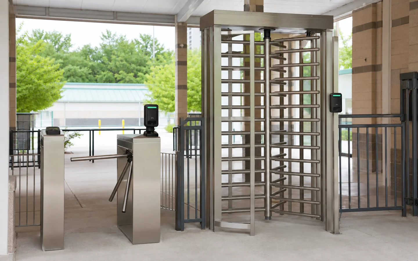 Tripod and full-height turnstiles for controlled pedestrian entry