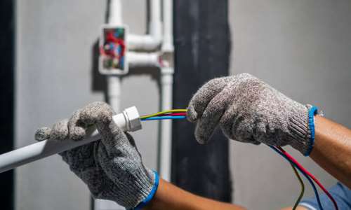 electrician pulling wire